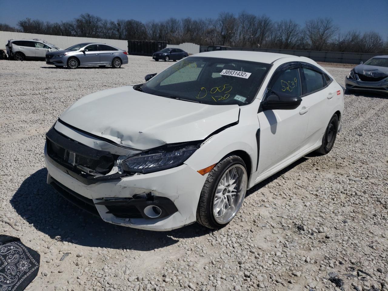 Photo 9 from auction – 2017 HONDA CIVIC LX with VIN 19XFC2F57HE005120