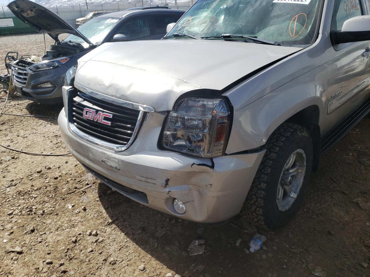 Photo 9 from auction – 2007 GMC YUKON with VIN 1GKFK13007J107810