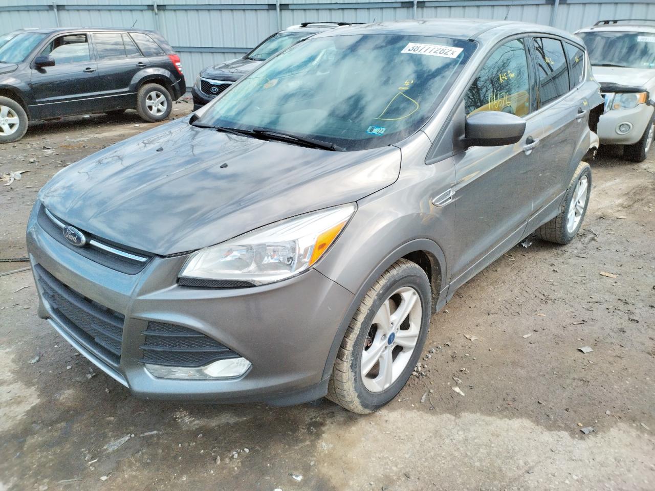 Photo 2 from auction – 2014 FORD ESCAPE SE with VIN 1FMCU9GX8EUE09318