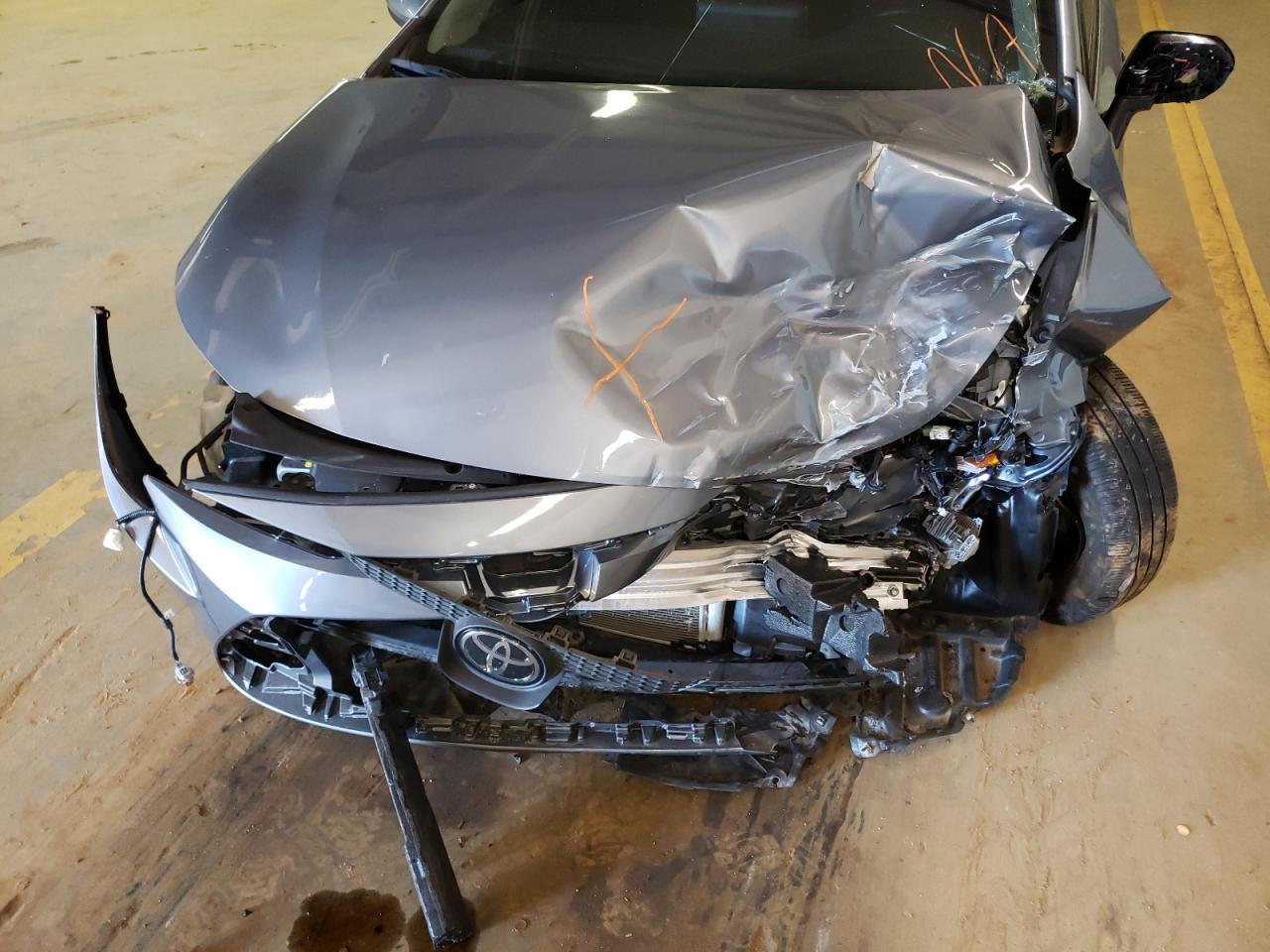 Photo 9 from auction – 2021 TOYOTA COROLLA LE with VIN JTDEPMAE1MJ125057