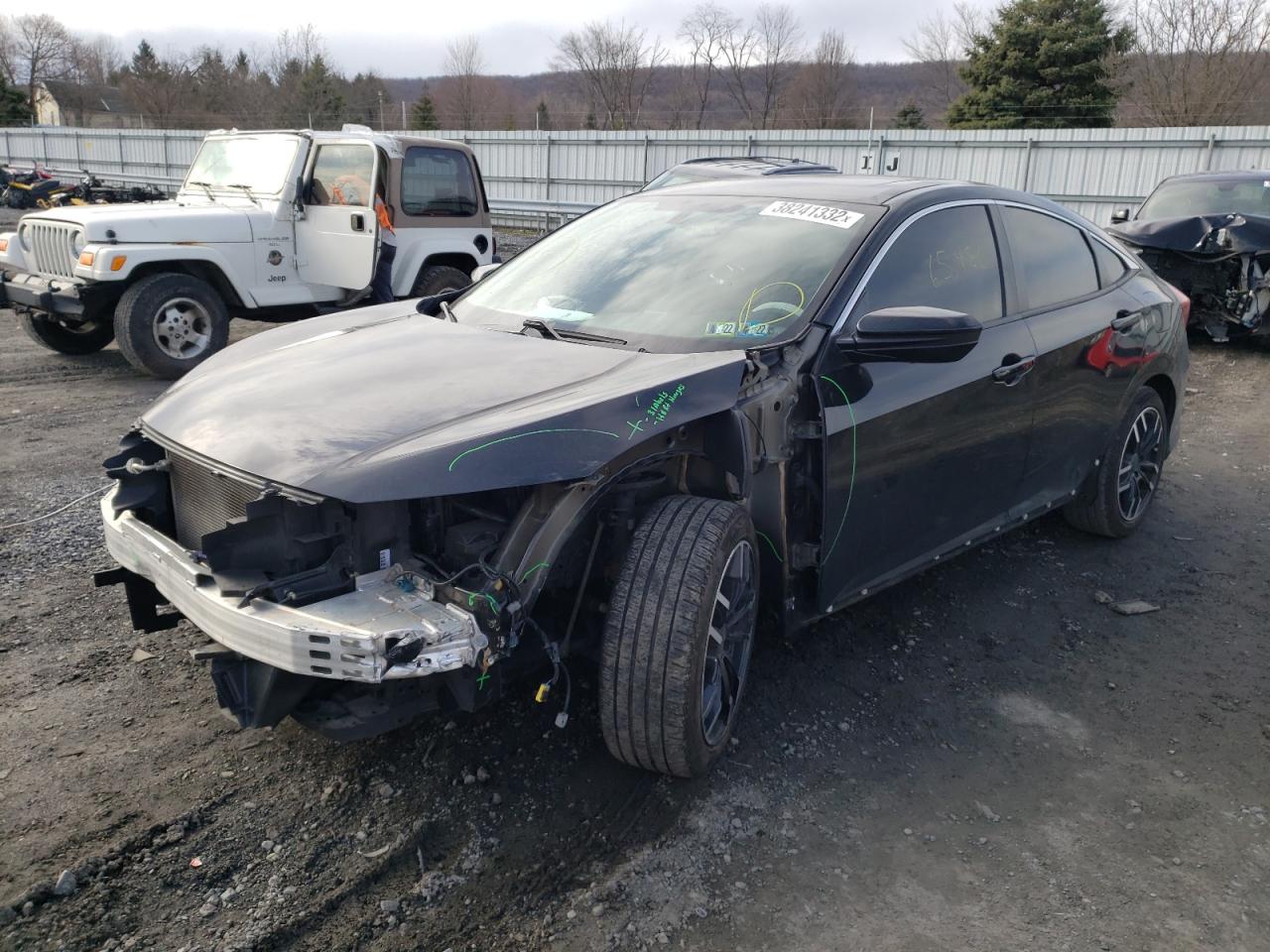 Photo 2 from auction – 2018 HONDA CIVIC EX with VIN 19XFC2F72JE032491