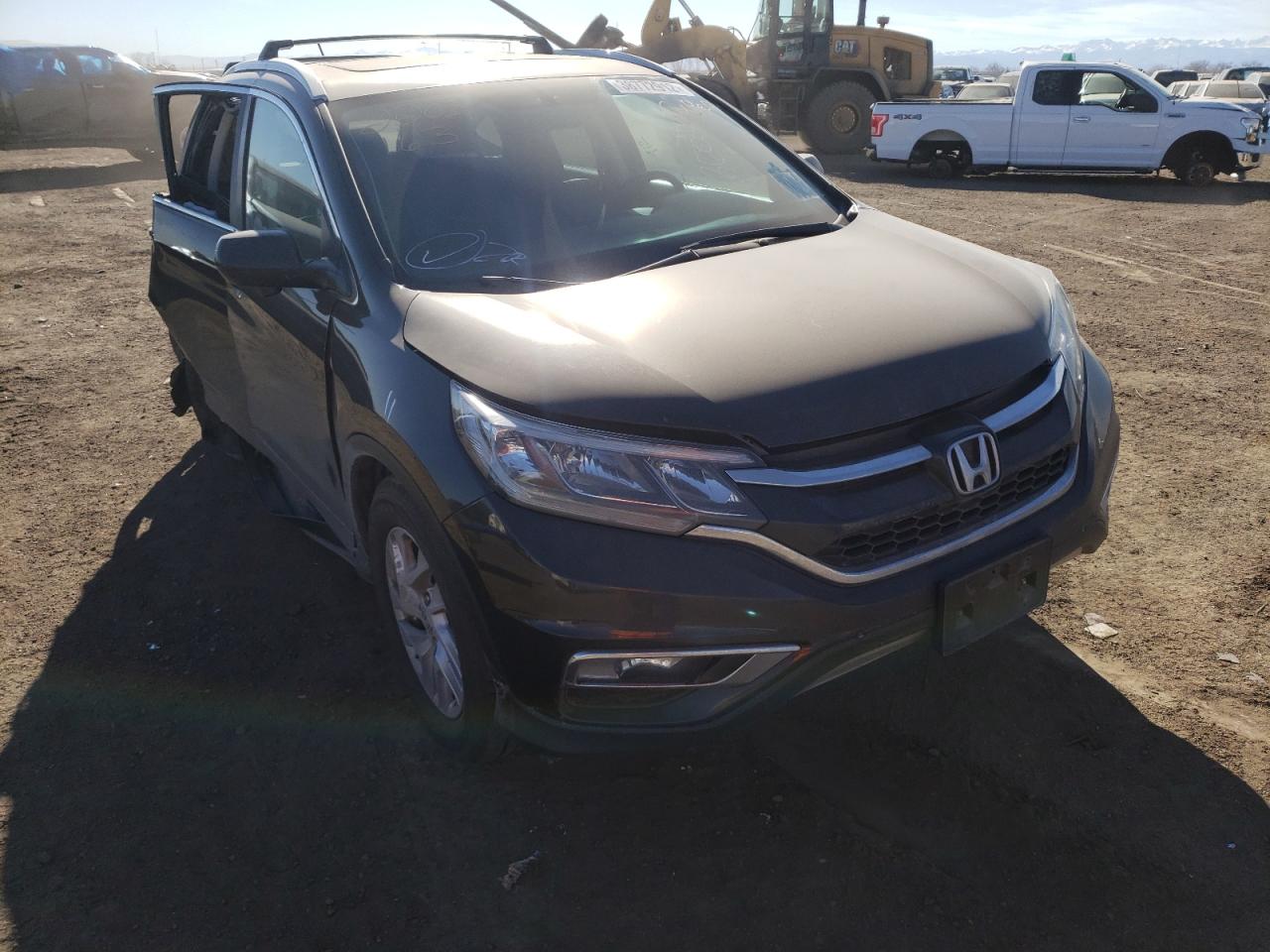 HONDA CR-V EXL 2015 with VIN 2HKRM4H71FH667675 - Photo from auction