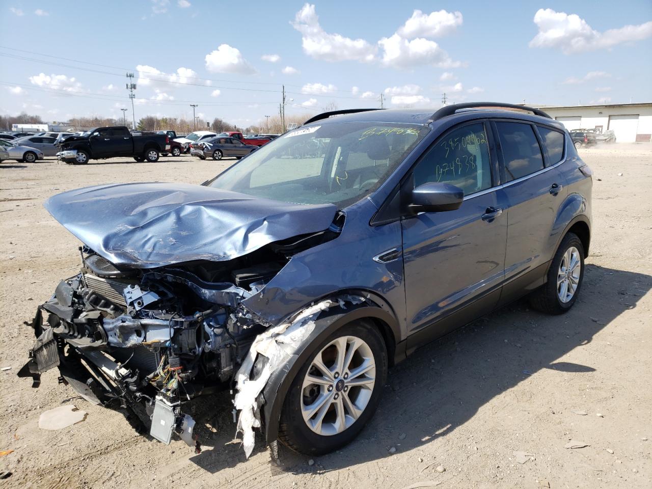 Photo 2 from auction – 2018 FORD ESCAPE SE with VIN 1FMCU9GD8JUB74838