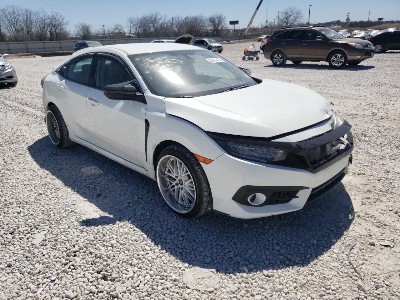 HONDA CIVIC LX 2017 with VIN 19XFC2F57HE005120 - Photo from auction