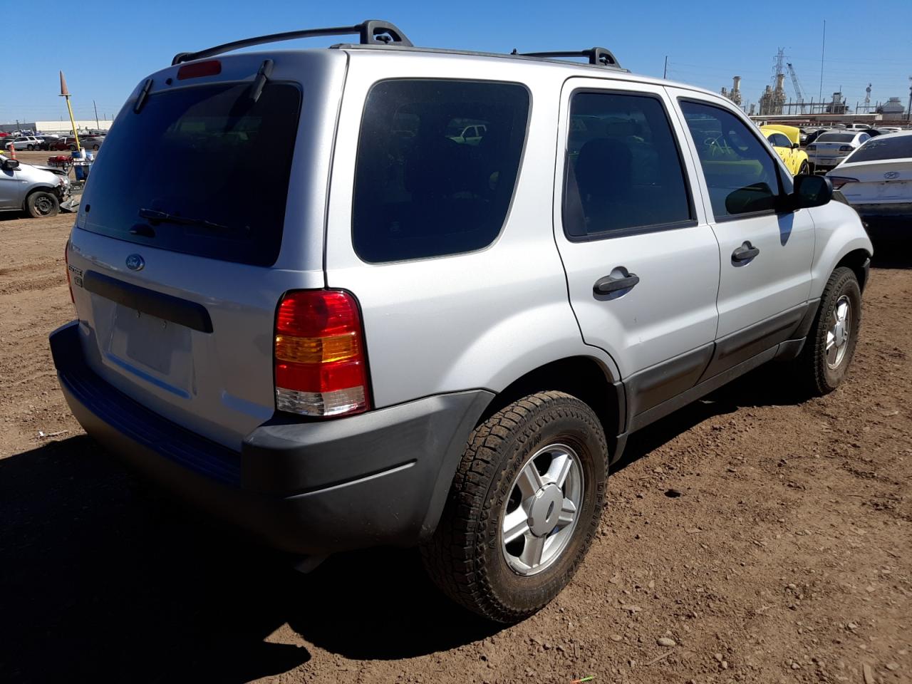 Photo 4 from auction – 2002 FORD ESCAPE XLS with VIN 1FMYU01162KC17571
