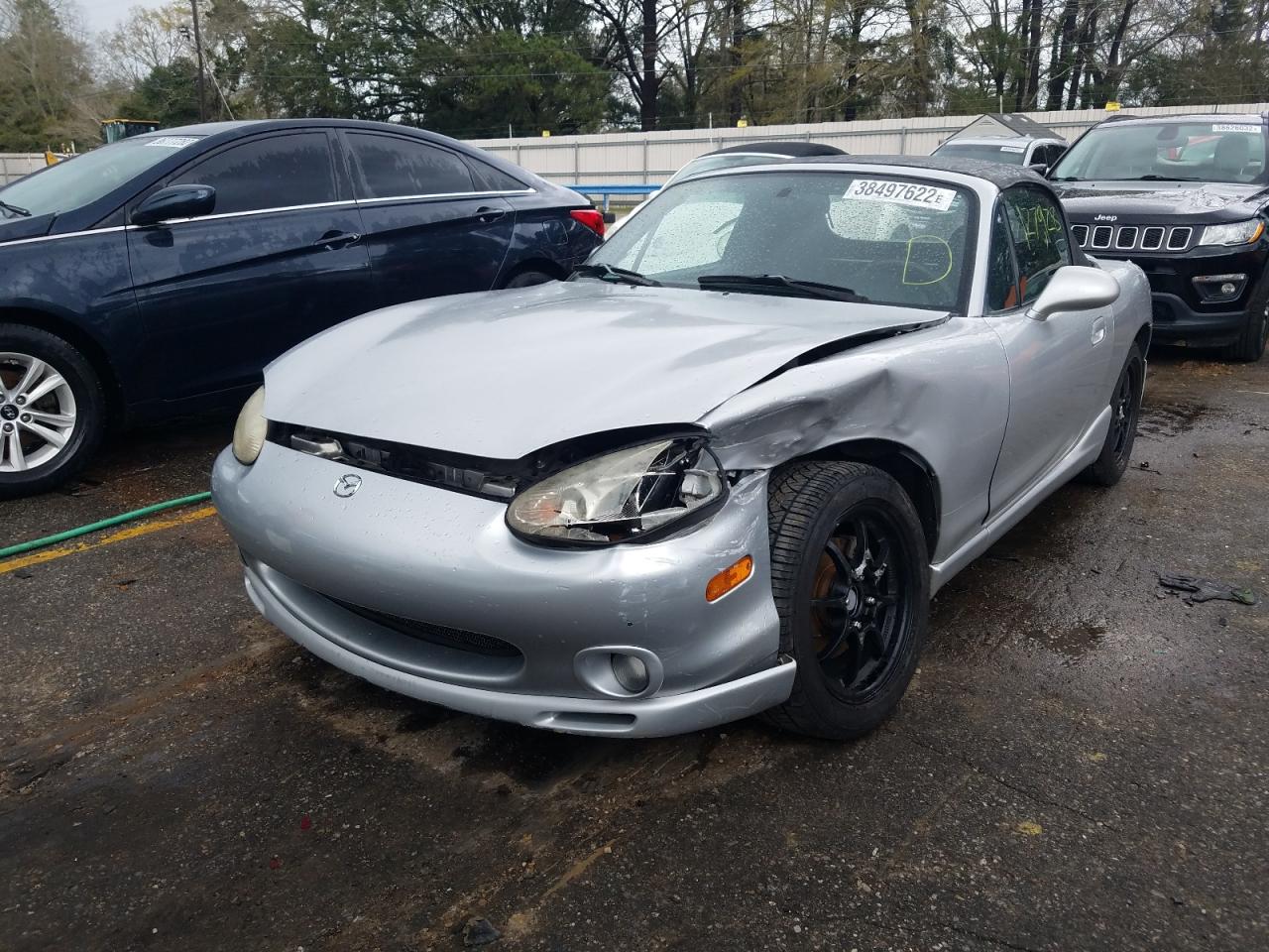 Photo 2 from auction – 1999 MAZDA MX-5 MIATA with VIN JM1NB3539X0123682
