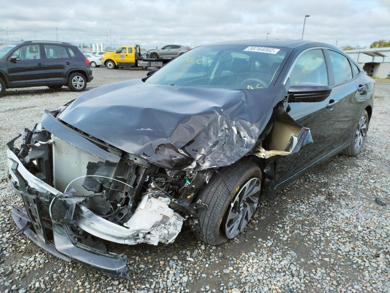 Photo 2 from auction – 2016 HONDA CIVIC EX with VIN 2HGFC2F70GH571657