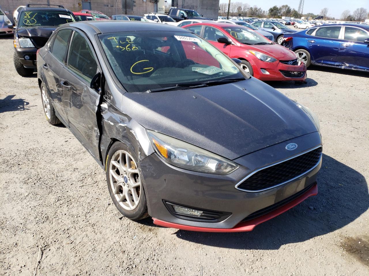 FORD FOCUS SE 2015 with VIN 1FADP3F2XFL252228 - Photo from auction