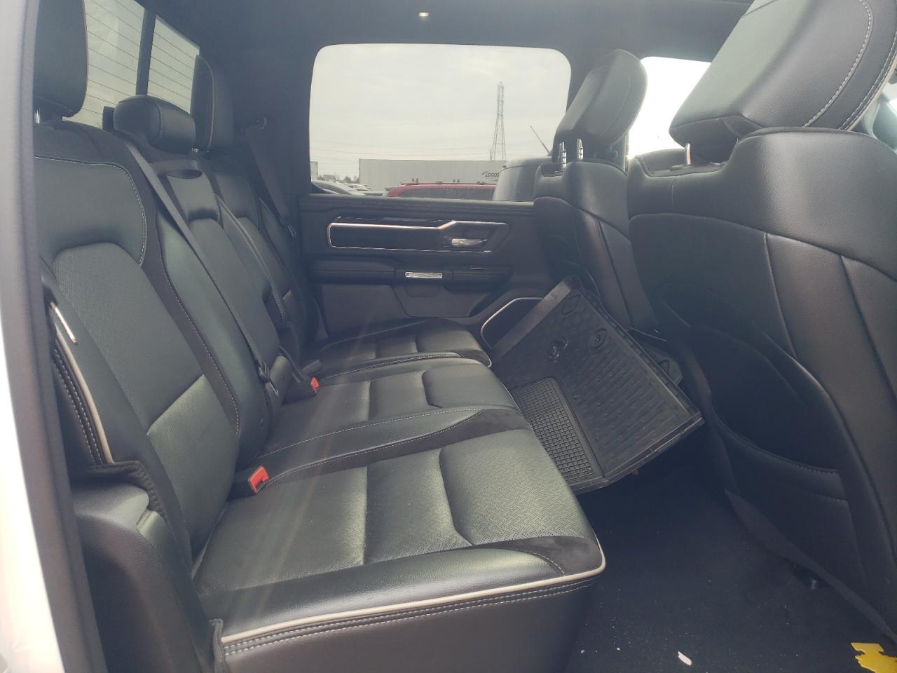 Photo 9 from auction – 2021 RAM 1500 LARAM with VIN 1C6SRFJT9MN595831
