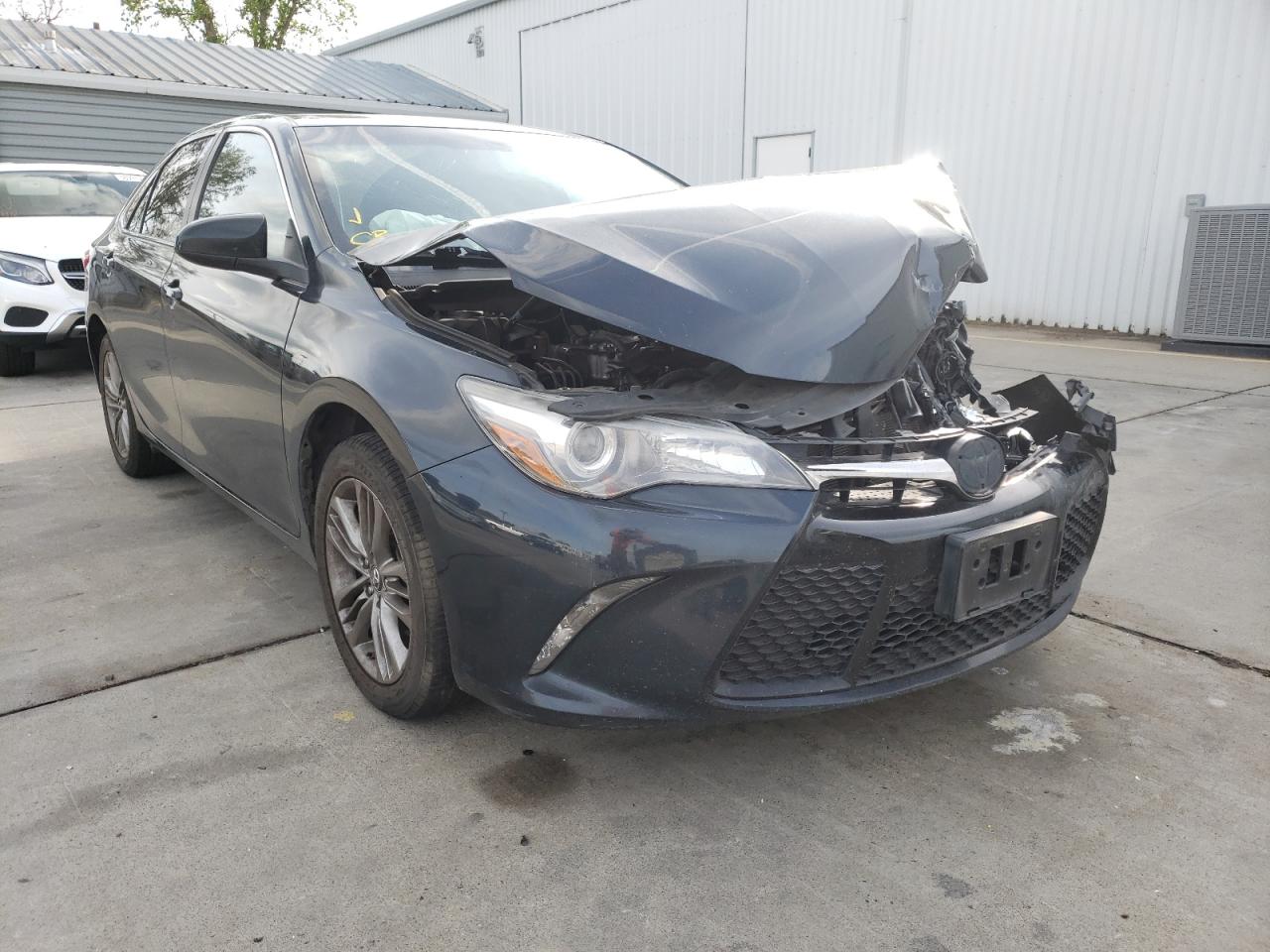 TOYOTA CAMRY LE 2017 with VIN 4T1BF1FK6HU745423 - Photo from auction