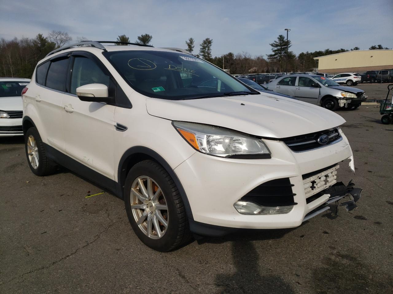 FORD ESCAPE TIT 2014 with VIN 1FMCU0J92EUA02746 - Photo from auction