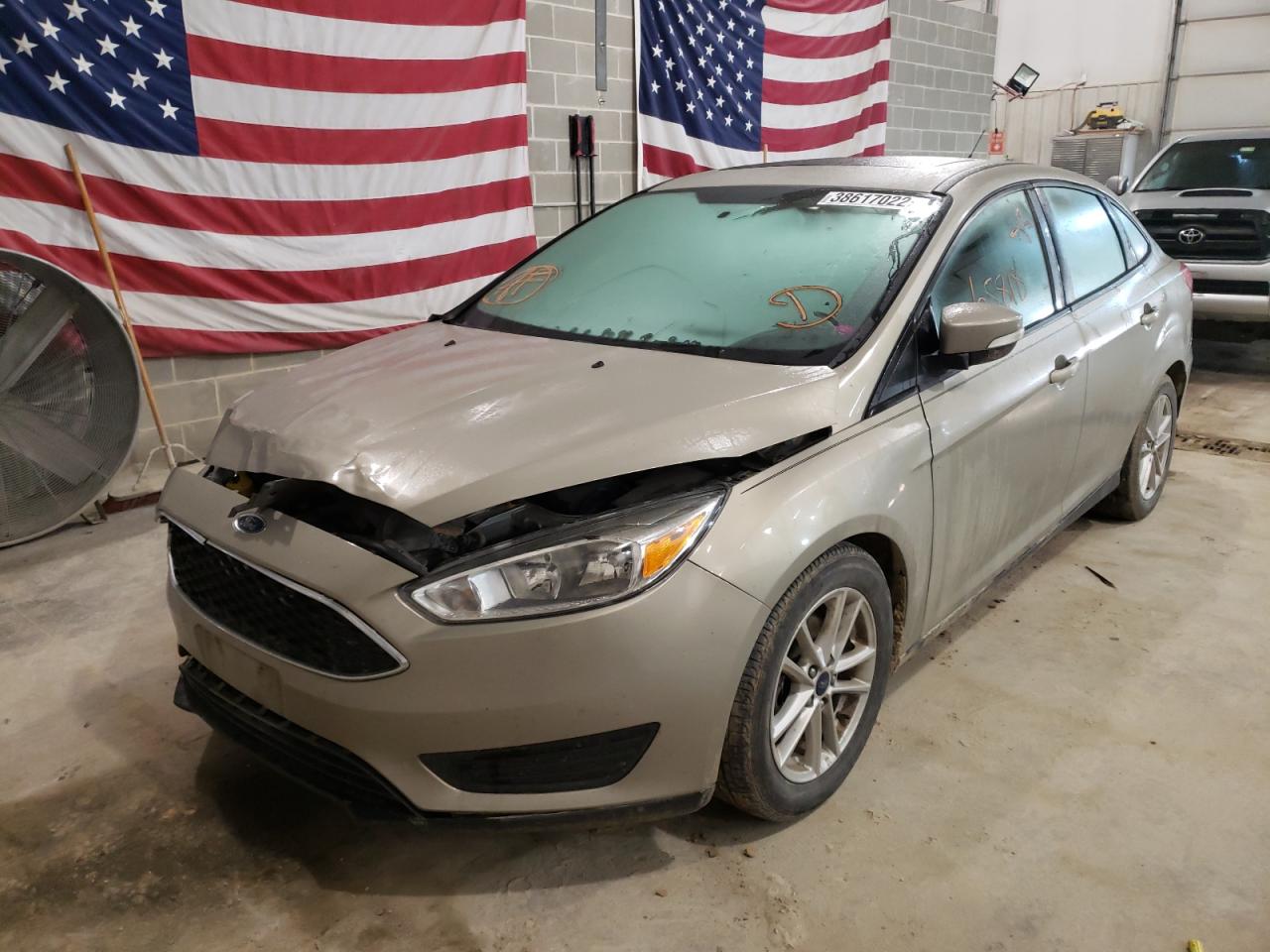 Photo 2 from auction – 2016 FORD FOCUS SE with VIN 1FADP3F22GL345293