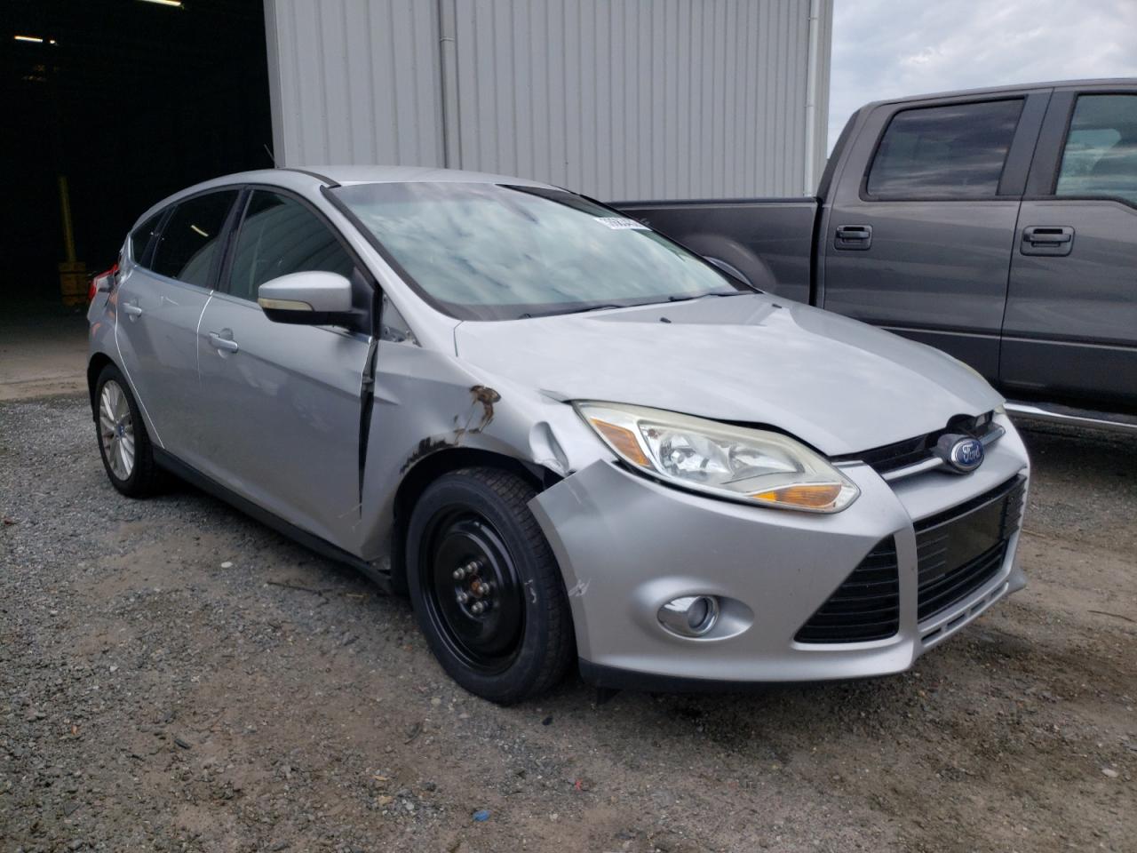 FORD FOCUS SEL 2012 with VIN 1FAHP3M22CL213990 - Photo from auction