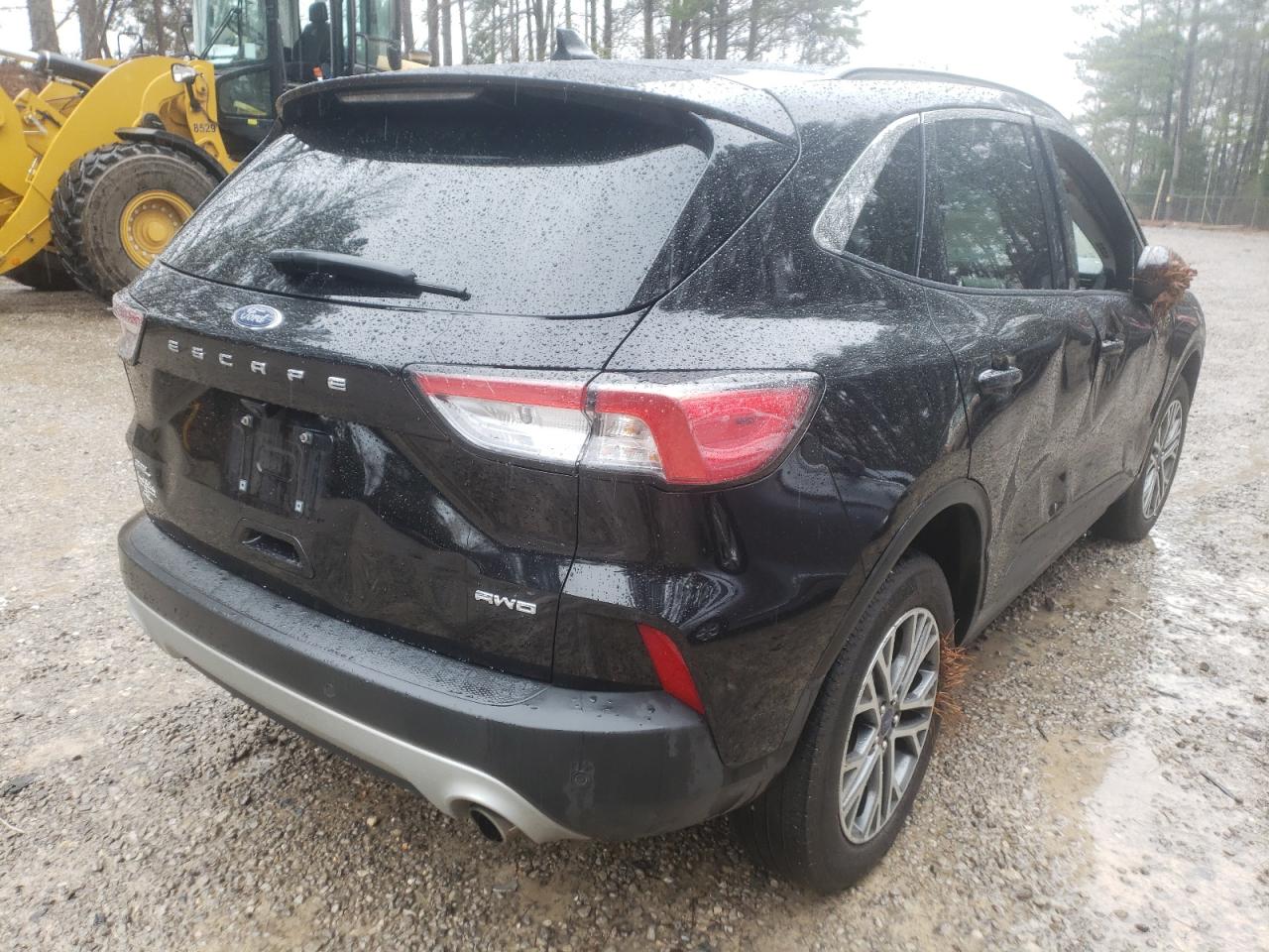 Photo 4 from auction – 2021 FORD ESCAPE SEL with VIN 1FMCU9H67MUB10133