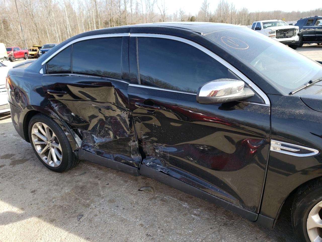 Photo 9 from auction – 2015 FORD TAURUS LIM with VIN 1FAHP2F92FG106679