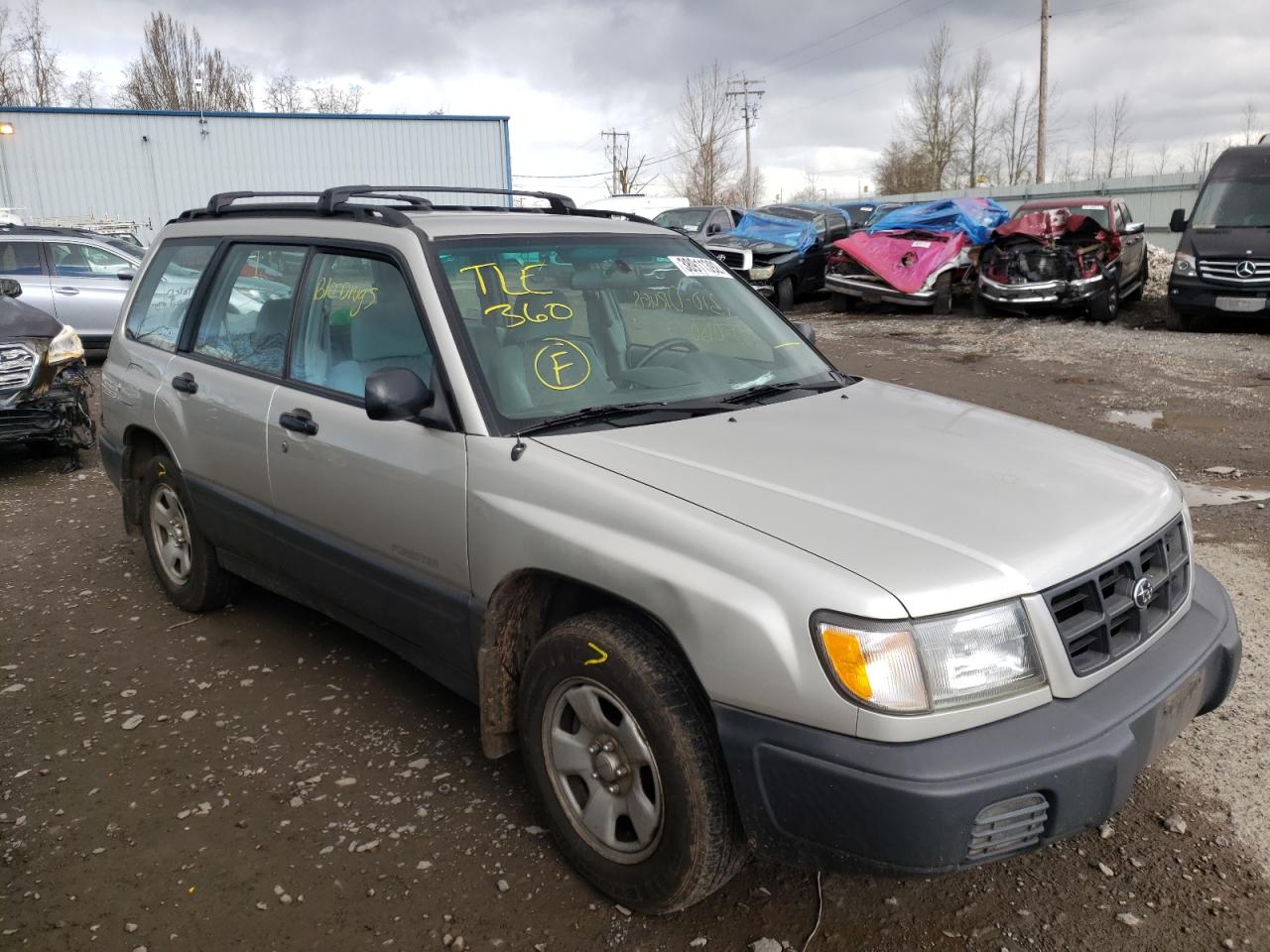 SUBARU FORESTER L 1999 with VIN JF1SF6351XH700550 - Photo from auction