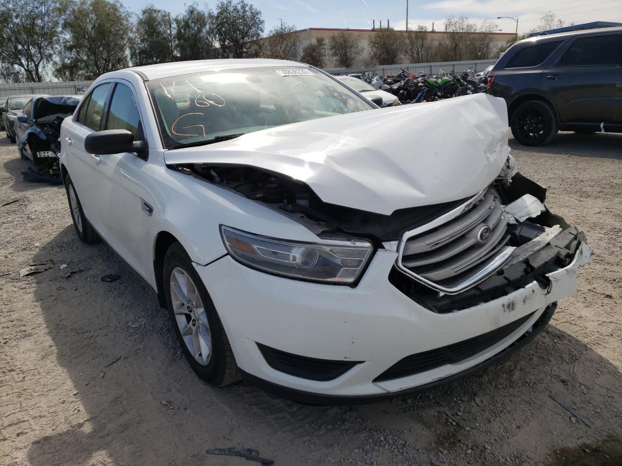 FORD TAURUS SE 2014 with VIN 1FAHP2D87EG122420 - Photo from auction