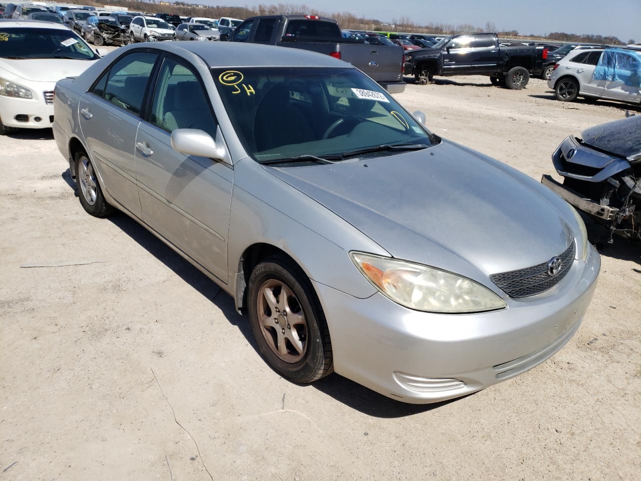 TOYOTA CAMRY LE 2002 with VIN 4T1BE32K32U064924 - Photo from auction
