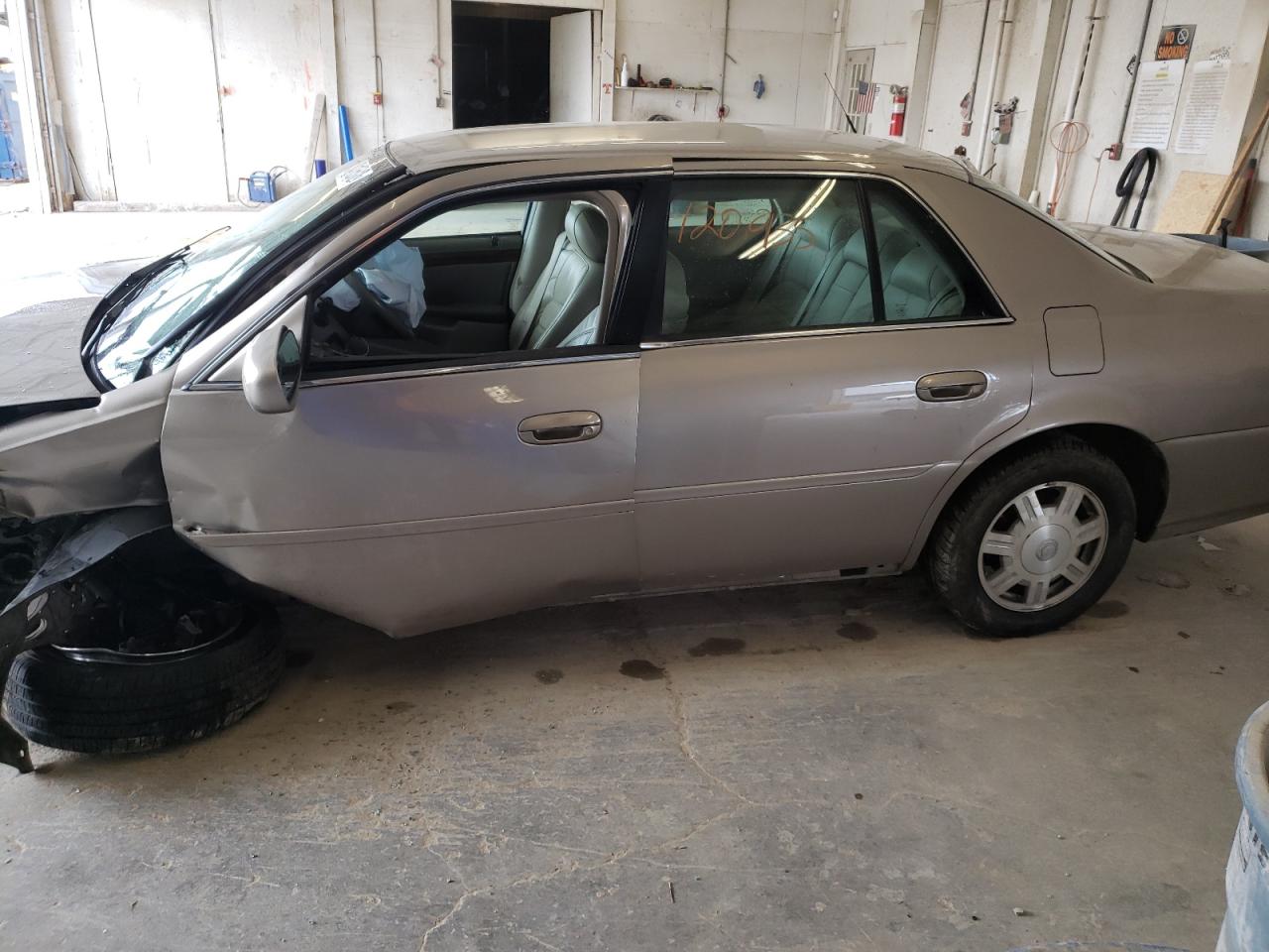 Photo 10 from auction – 2004 CADILLAC DEVILLE with VIN 1G6KD54Y54U116550