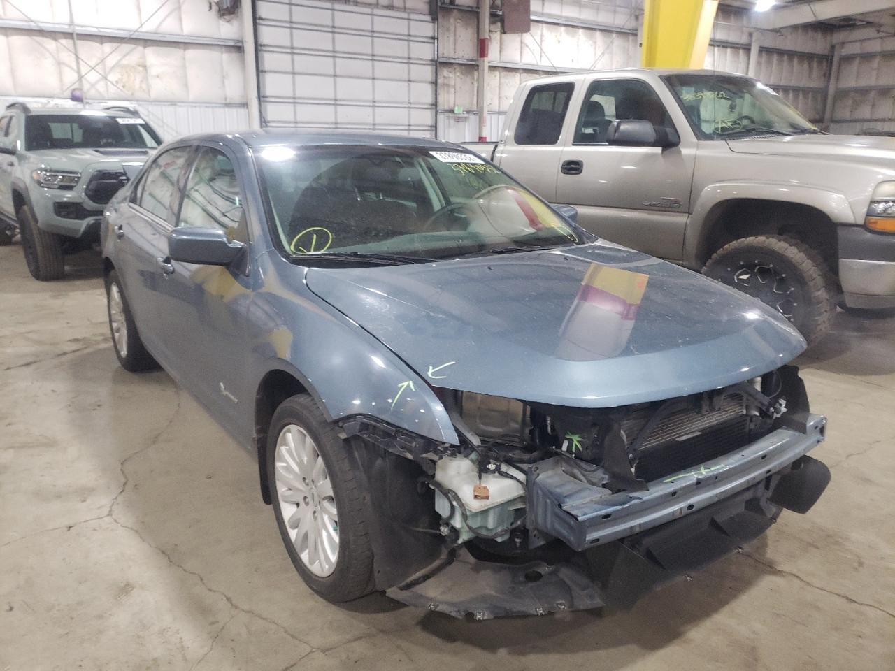 FORD FUSION HYB 2012 with VIN 3FADP0L36CR310604 - Photo from auction
