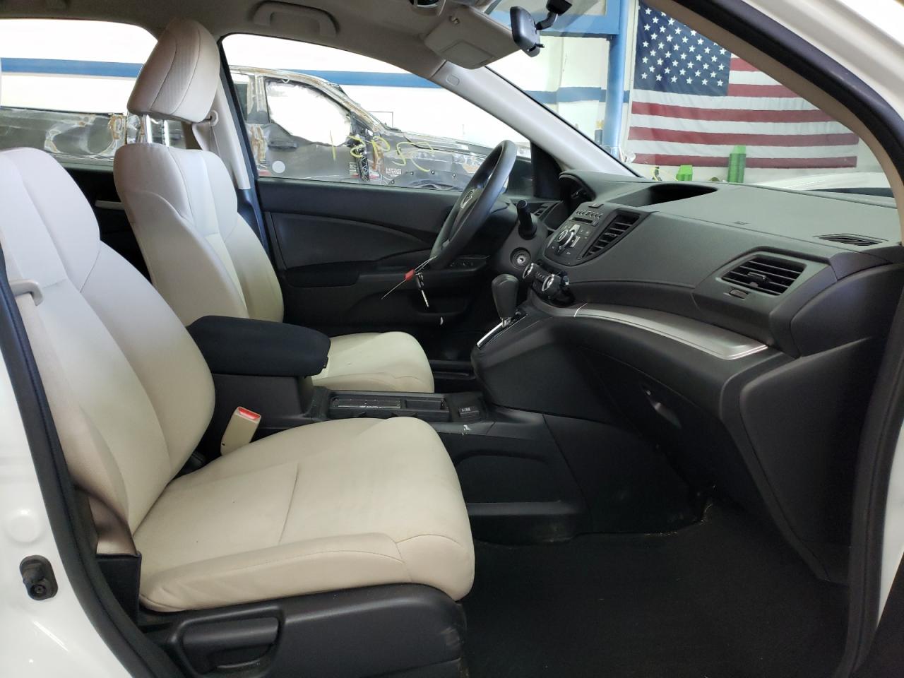 Photo 5 from auction – 2016 HONDA CR-V LX with VIN 5J6RM4H36GL009161