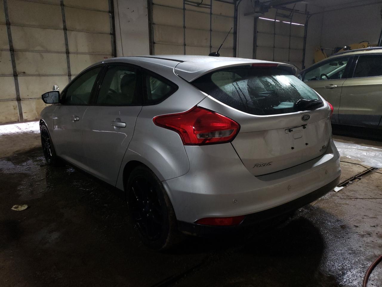 Photo 3 from auction – 2016 FORD FOCUS SE with VIN 1FADP3K29GL224895