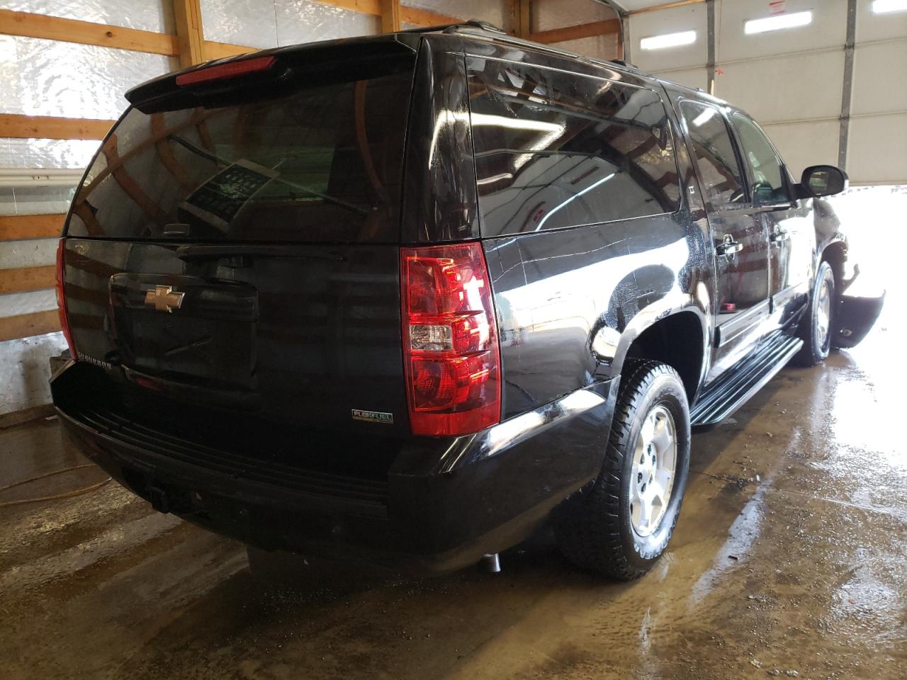 Photo 4 from auction – 2010 CHEVROLET SUBURBAN K with VIN 1GNUKJE33AR214733