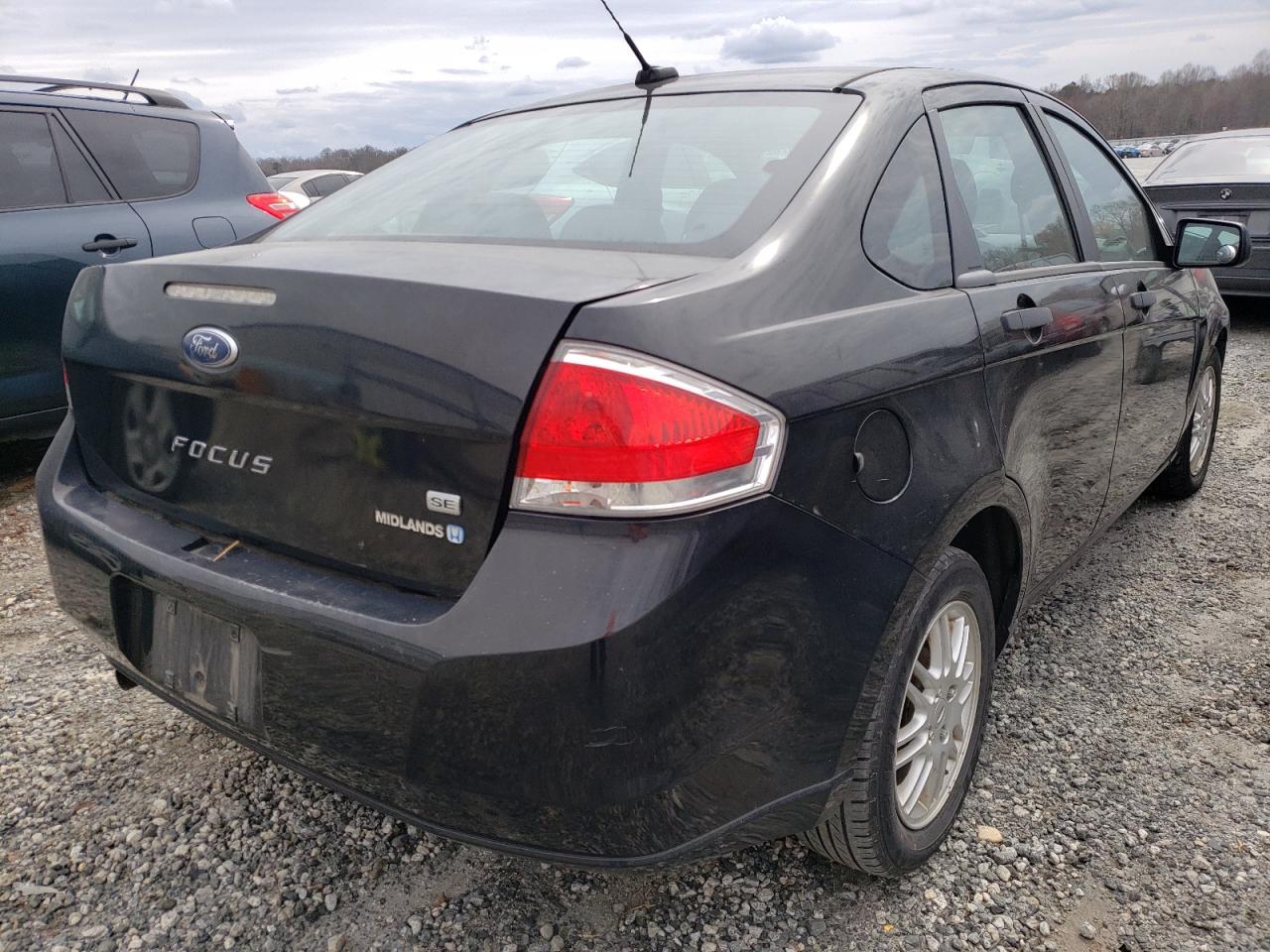 Photo 4 from auction – 2011 FORD FOCUS SE with VIN 1FAHP3FN6BW156570