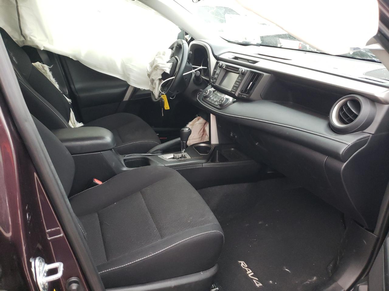 Photo 5 from auction – 2016 TOYOTA RAV4 XLE with VIN 2T3WFREV8GW288714