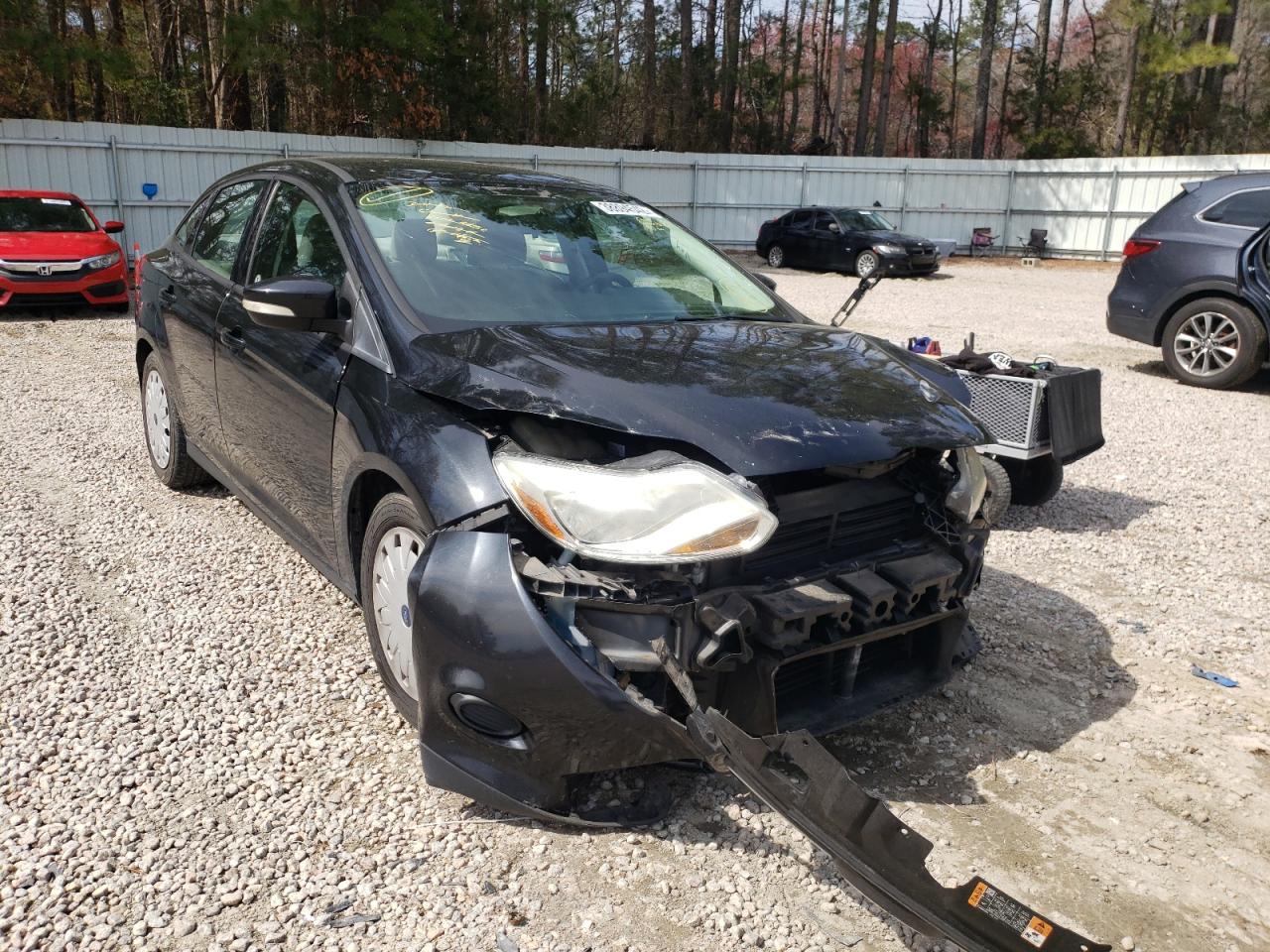 FORD FOCUS 2014 with VIN 1FADP3F29EL394035 - Photo from auction