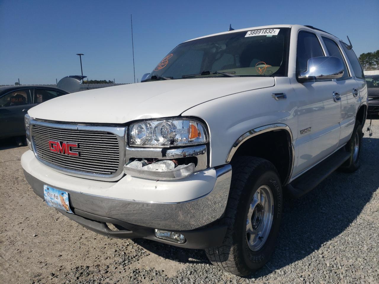 Photo 2 from auction – 2003 GMC YUKON with VIN 1GKEC13Z03R259380