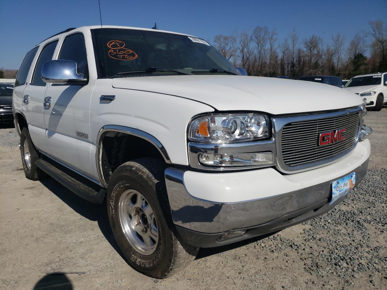 GMC YUKON 2003 with VIN 1GKEC13Z03R259380 - Photo from auction