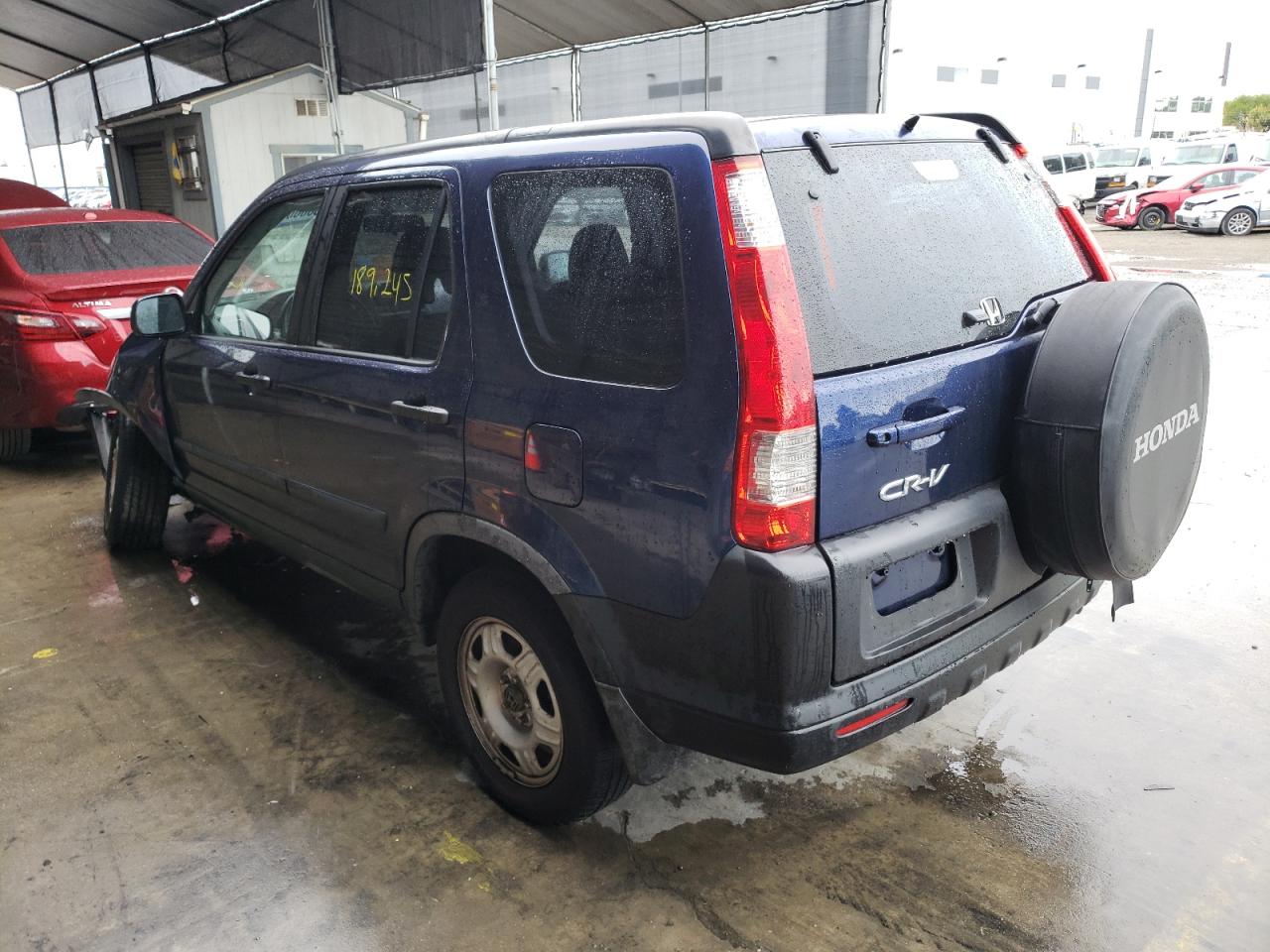Photo 3 from auction – 2005 HONDA CR-V LX with VIN JHLRD68595C007634