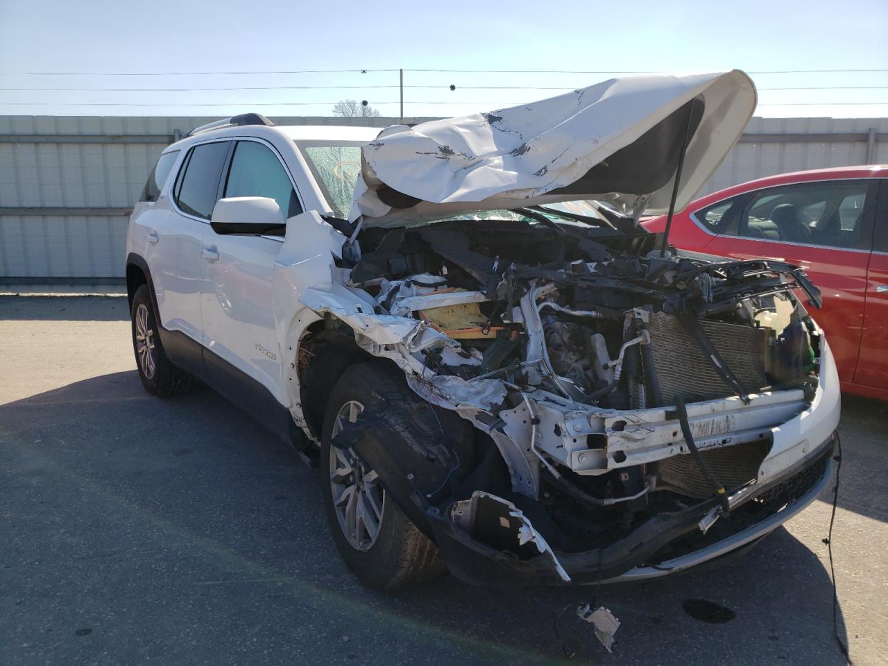 GMC ACADIA SLT 2018 with VIN 1GKKNULS4JZ175383 - Photo from auction