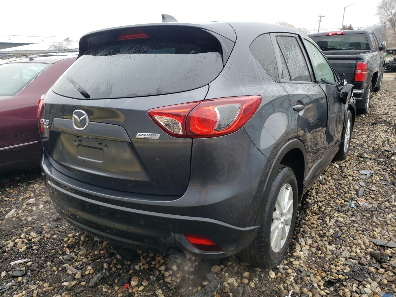 Photo 4 from auction – 2014 MAZDA CX-5 TOURI with VIN JM3KE4CY9E0323738