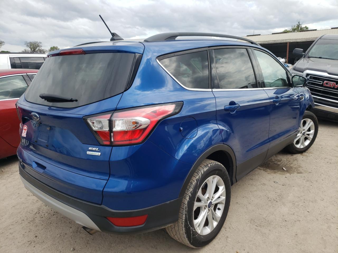 Photo 4 from auction – 2018 FORD ESCAPE SEL with VIN 1FMCU0HD7JUA94604
