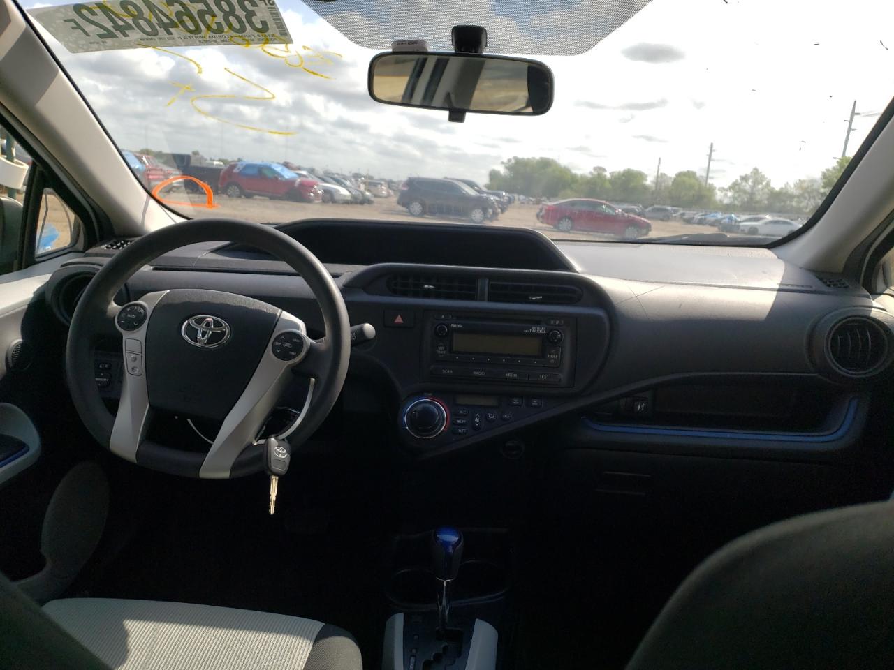 Photo 9 from auction – 2013 TOYOTA PRIUS C with VIN JTDKDTB31D1542696