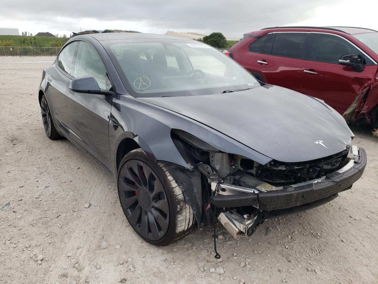 TESLA MODEL 3 2021 with VIN 5YJ3E1EC4MF030181 - Photo from auction