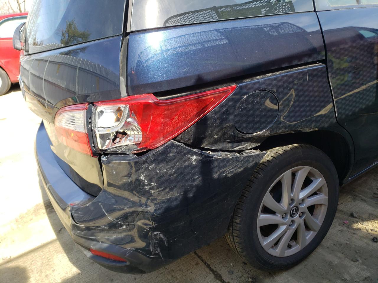 Photo 9 from auction – 2015 MAZDA 5 SPORT with VIN JM1CW2BL7F0191116
