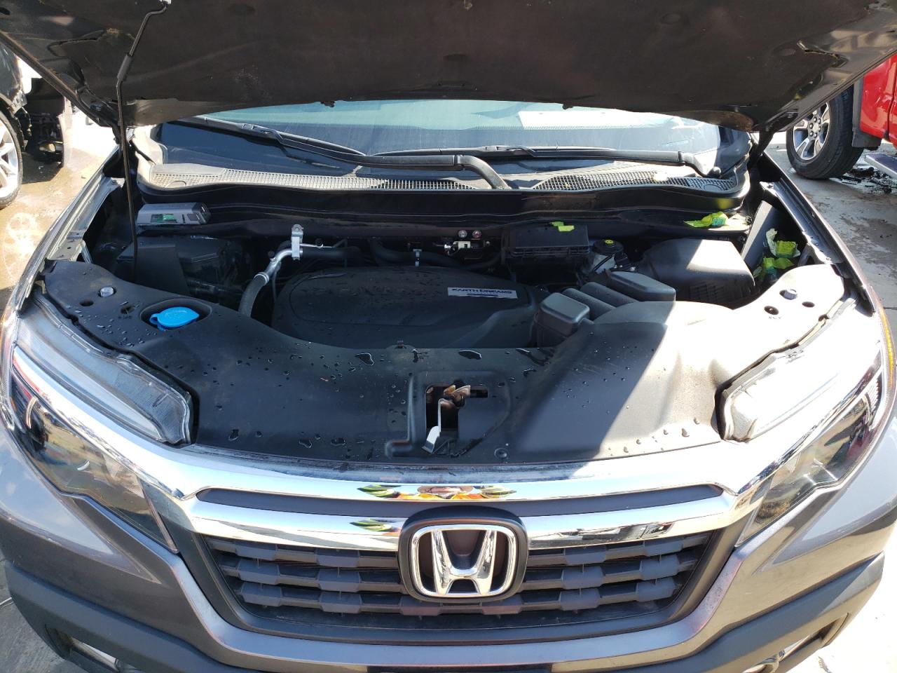 Photo 7 from auction – 2018 HONDA RIDGELINE with VIN 5FPYK3F50JB008966