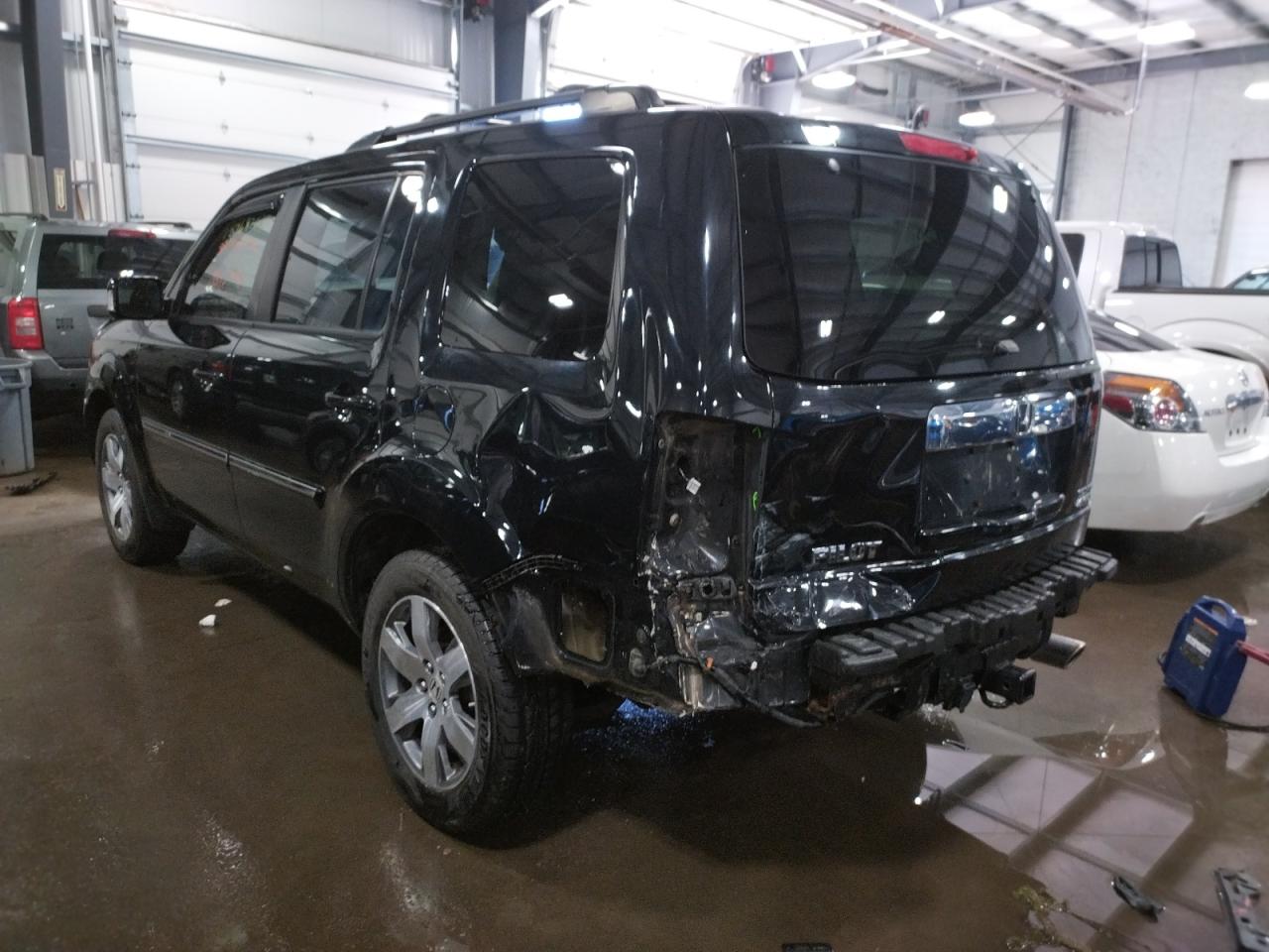 Photo 3 from auction – 2014 HONDA PILOT TOUR with VIN 5FNYF4H98EB006858