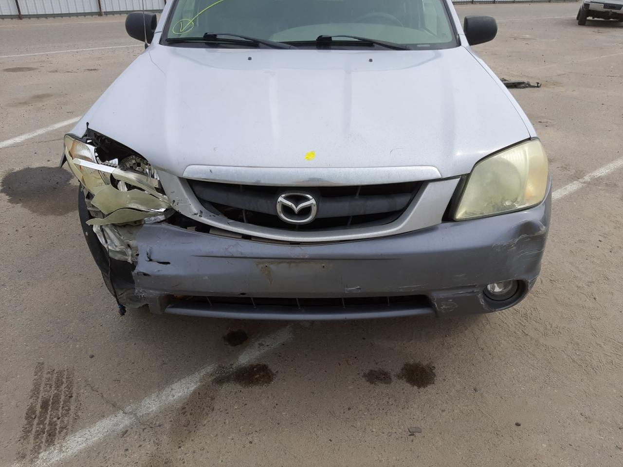 Photo 7 from auction – 2002 MAZDA TRIBUTE LX with VIN 4F2CU09142KM51694