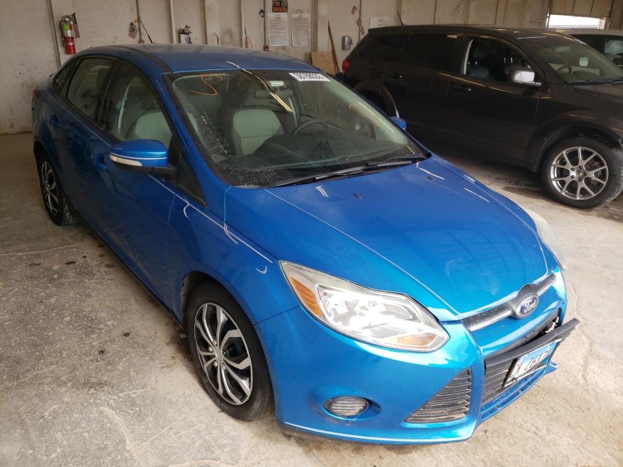 FORD FOCUS SE 2013 with VIN 1FADP3F28DL340238 - Photo from auction