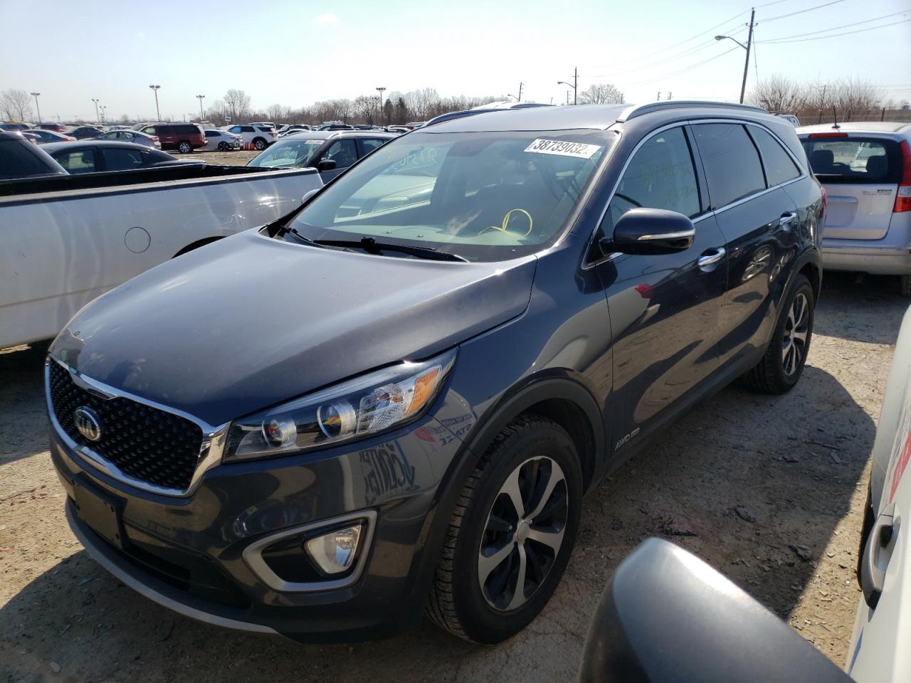 Photo 2 from auction – 2016 KIA SORENTO EX with VIN 5XYPHDA53GG040554