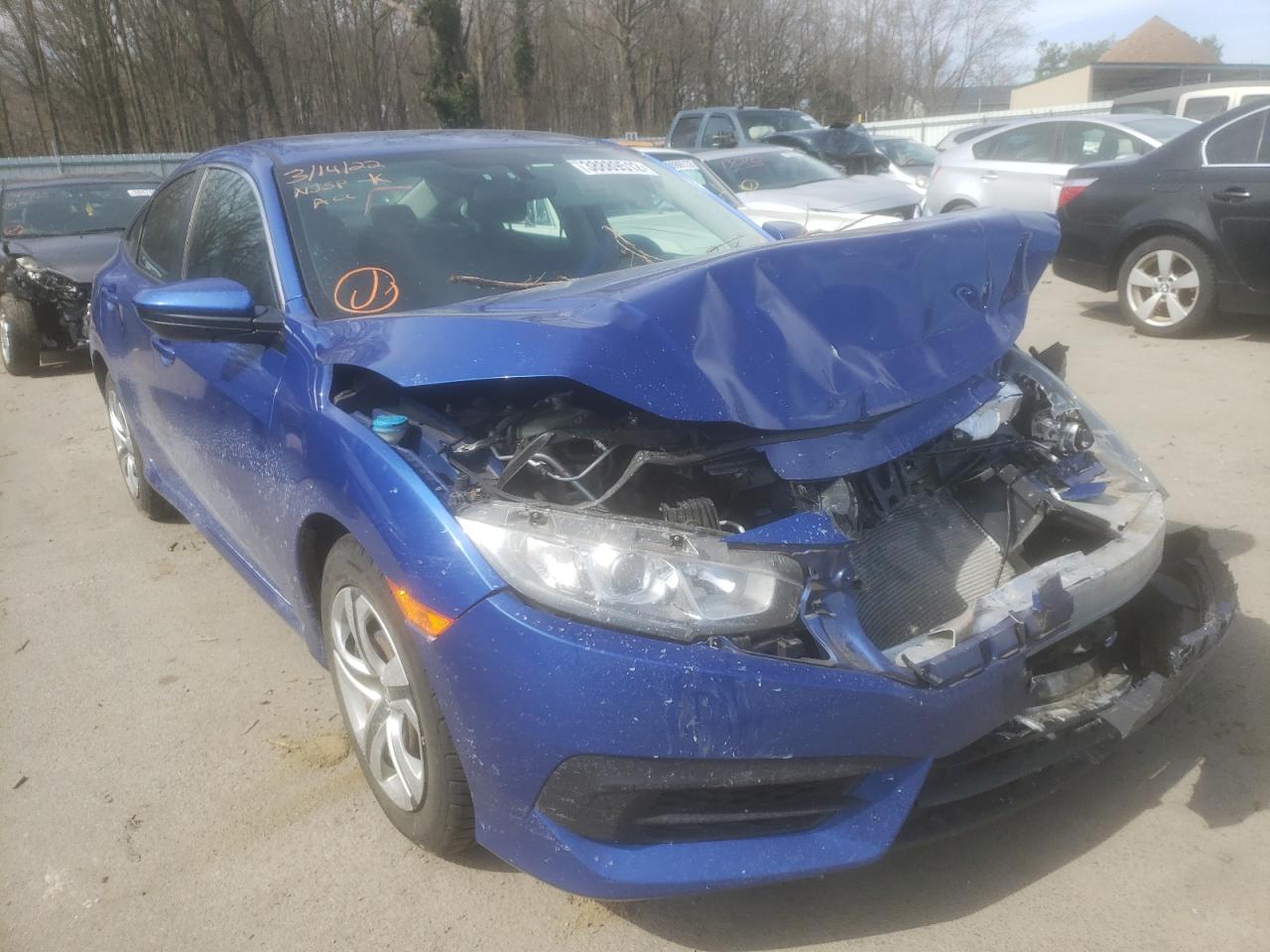 HONDA CIVIC LX 2018 with VIN 2HGFC2F57JH536703 - Photo from auction