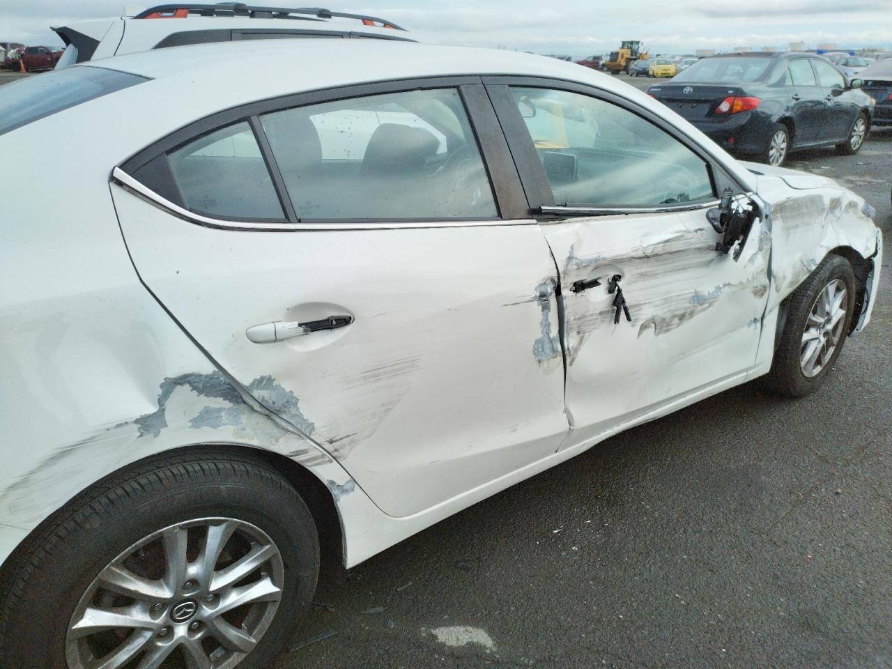 Photo 9 from auction – 2016 MAZDA 3 TOURING with VIN JM1BM1V74G1301593