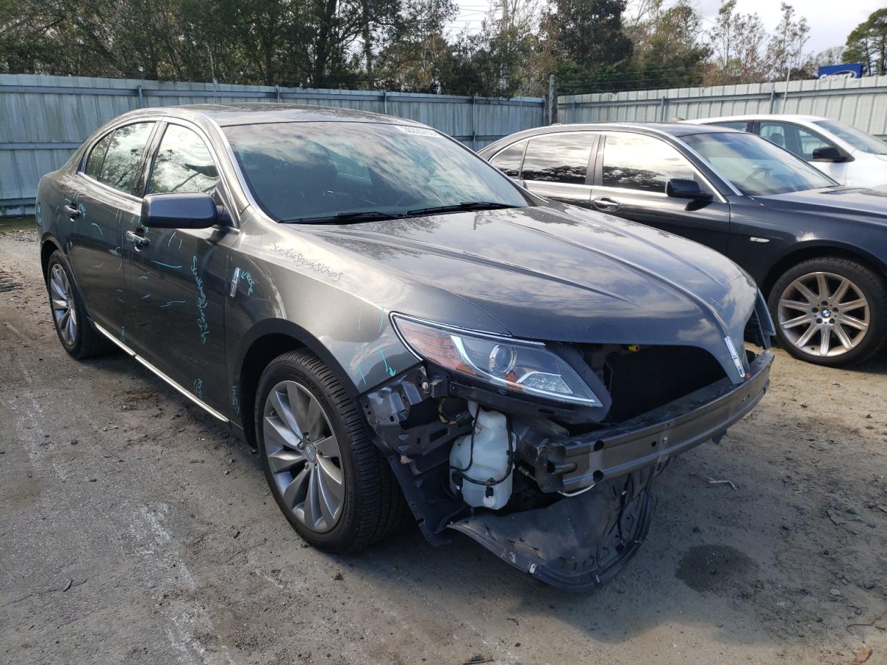 LINCOLN MKS 2016 with VIN 1LNHL9DK0GG601805 - Photo from auction