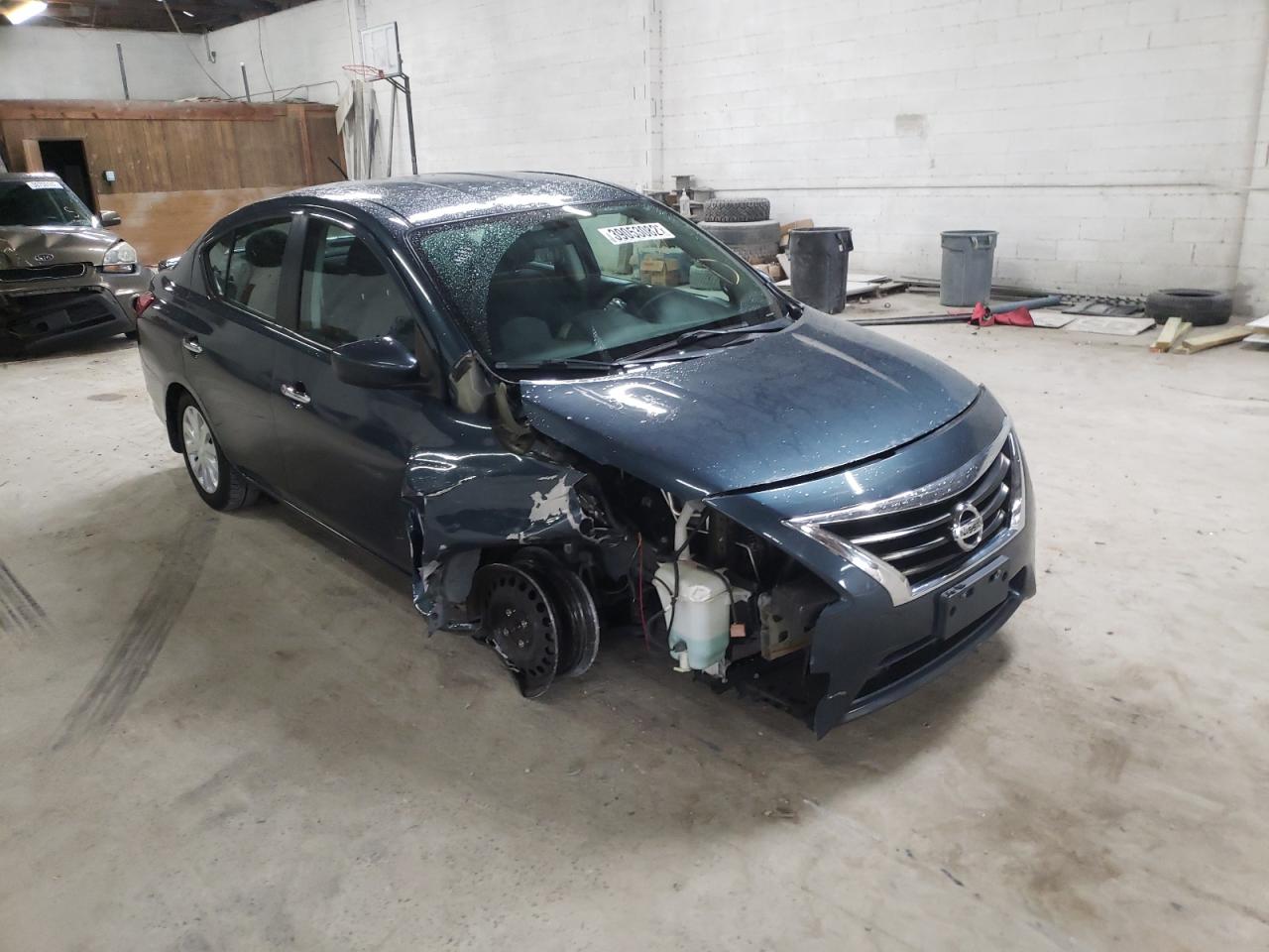 NISSAN VERSA S 2015 with VIN 3N1CN7AP1FL950711 - Photo from auction
