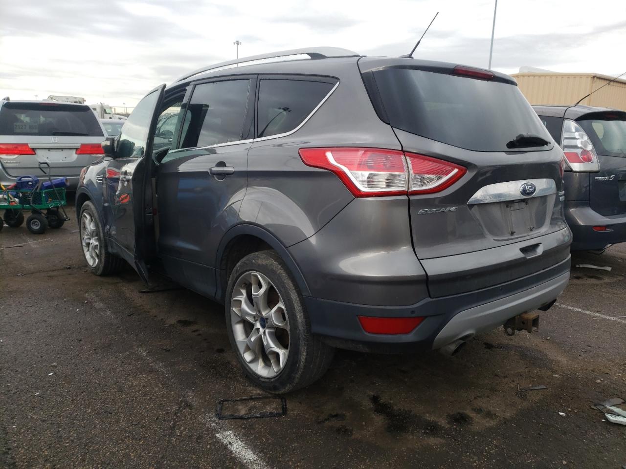 Photo 3 from auction – 2014 FORD ESCAPE TIT with VIN 1FMCU0J90EUA28391