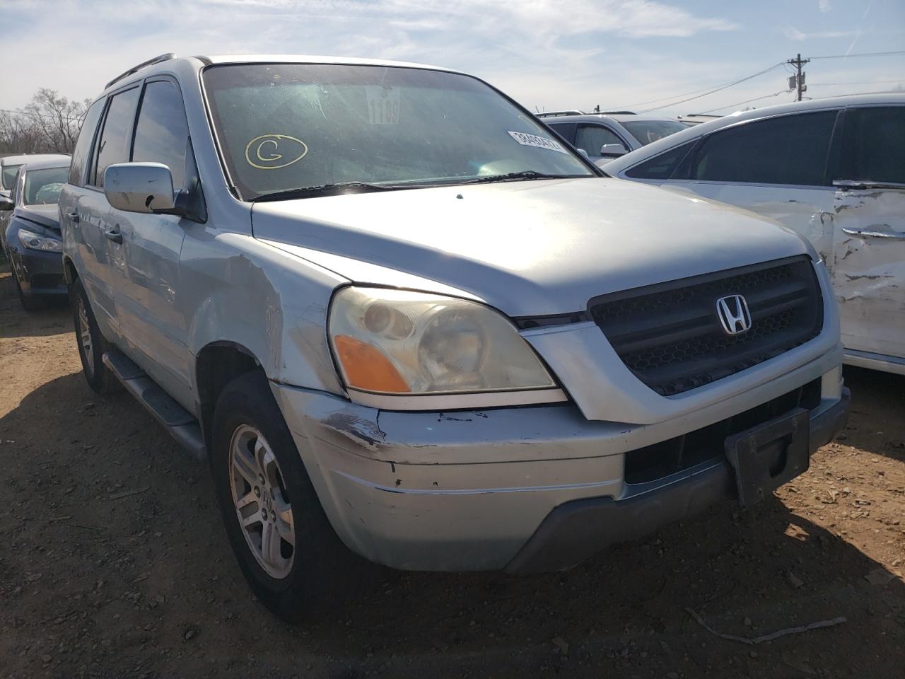 HONDA PILOT EXL 2003 with VIN 2HKYF18523H572928 - Photo from auction